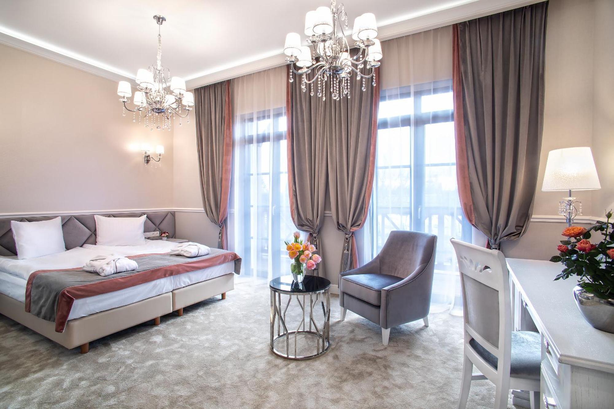 Boutique Odyseja & Spa Ciechocinek Kültér fotó A room at the hotel