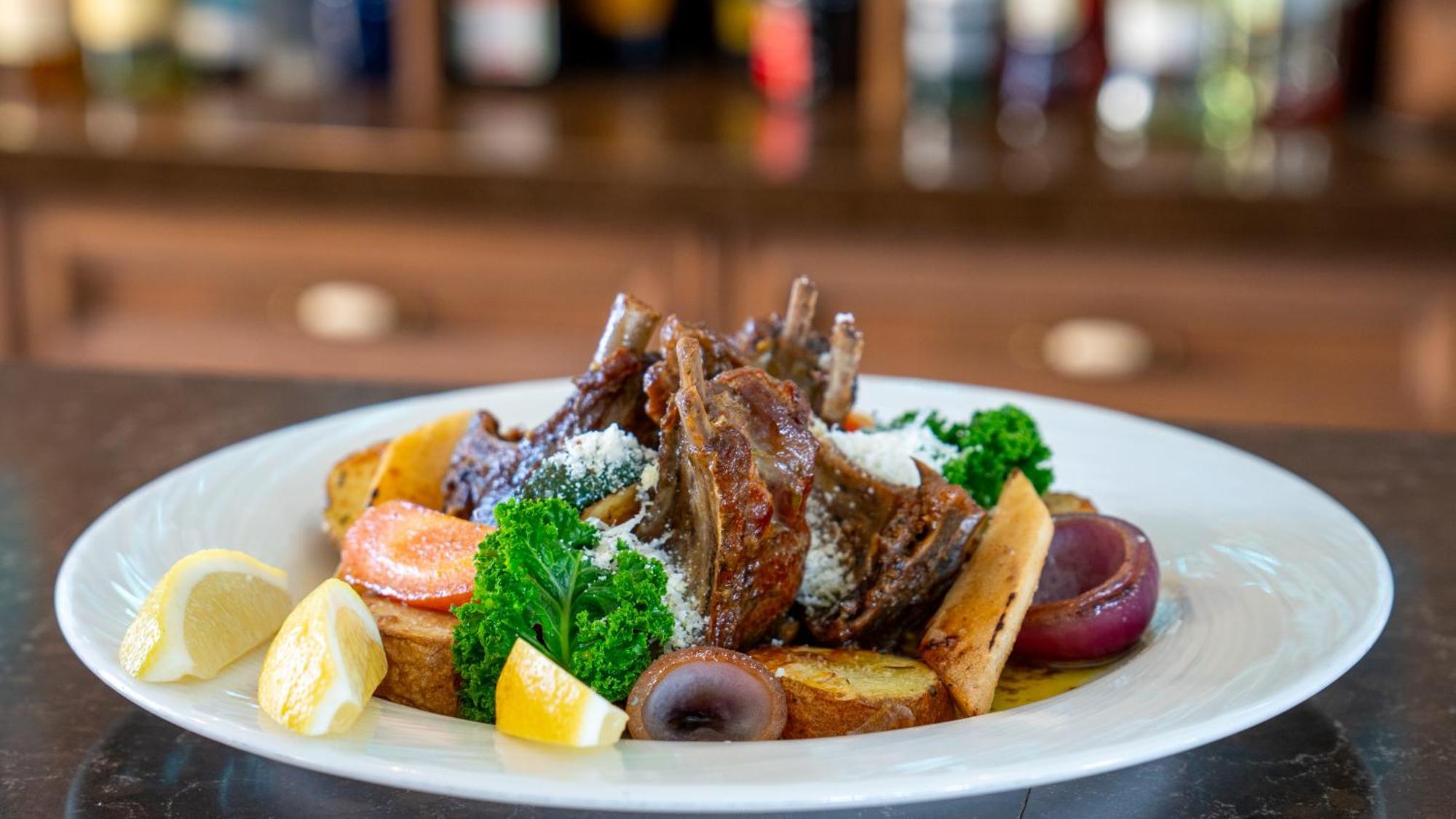 Boutique Odyseja & Spa Ciechocinek Kültér fotó A plate of grilled lamb chops