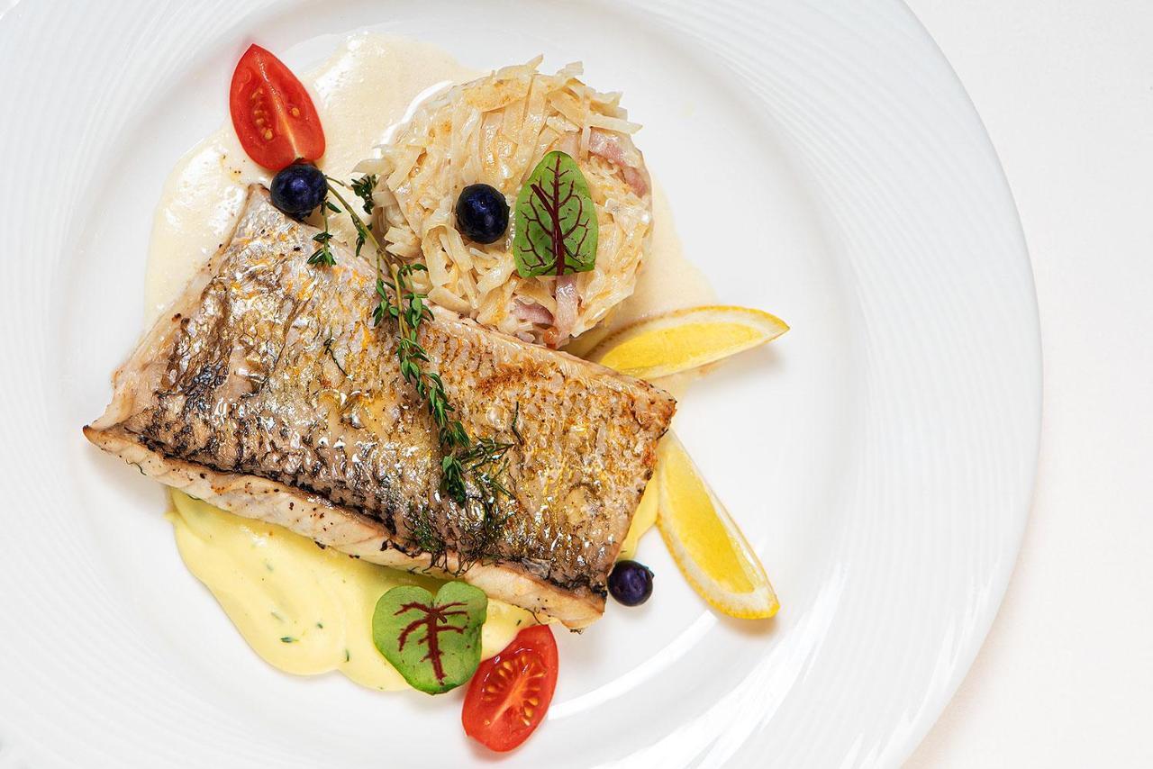 Boutique Odyseja & Spa Ciechocinek Kültér fotó A prepared dish of Arctic char