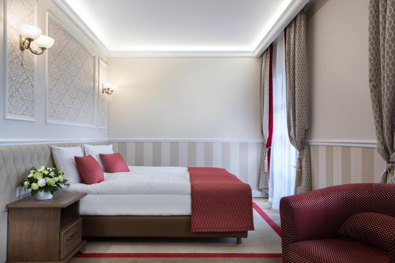 Boutique Odyseja & Spa Ciechocinek Kültér fotó A room at the hotel