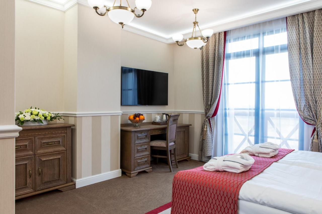 Boutique Odyseja & Spa Ciechocinek Kültér fotó A room at the hotel